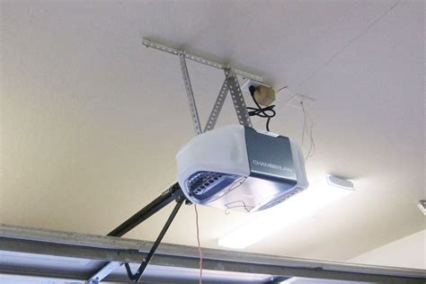 add electrical box in rafter for garage door opener|garage door opener receptacle positioning.